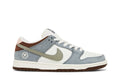 Tênis Yuto Horigome x Nike SB Dunk Low Azul vista lateral